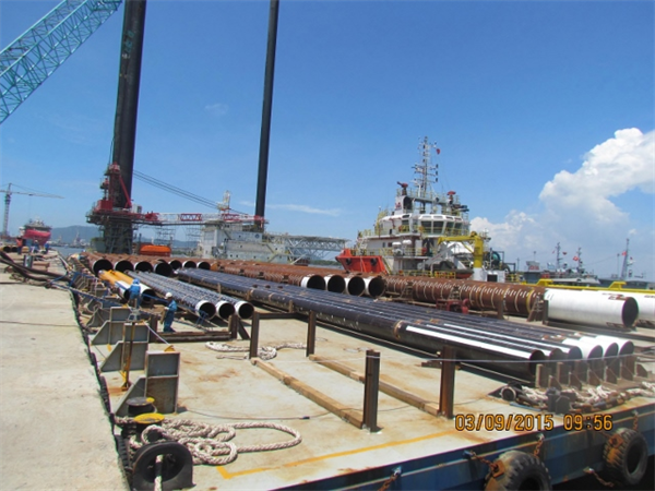 Provide manpower, transportation, equipment and port services for loading out, transporting 1828 tons of jacket piles from fabrication yard onto Barge. - Contract No.: DXP-Q-058